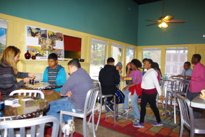 Dr. Ruthie Yow hanging out with teens at our Grand Opening of the Community Action Cafe.